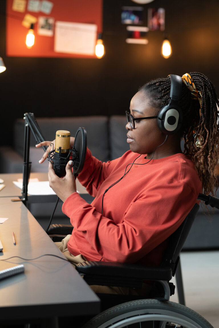 Woman with disability preparing for online broadcasting